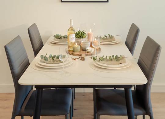 A dining table set with plates and glasses with a painting hanging on the wall at Cherrywood Apartments, D18 VY3V, DUBLIN 18