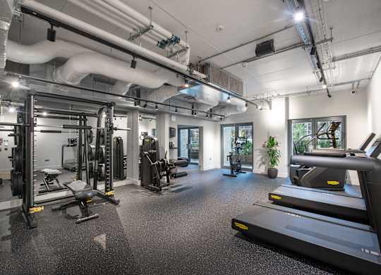 Gym with treadmills at The Lark, London, SW11 7EA