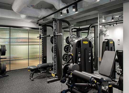 Gym with a variety of equipment at The Lark, London