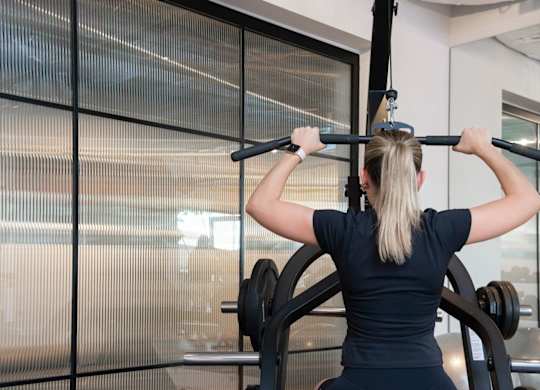 Woman working out at The Lark, London, SW11 7EA