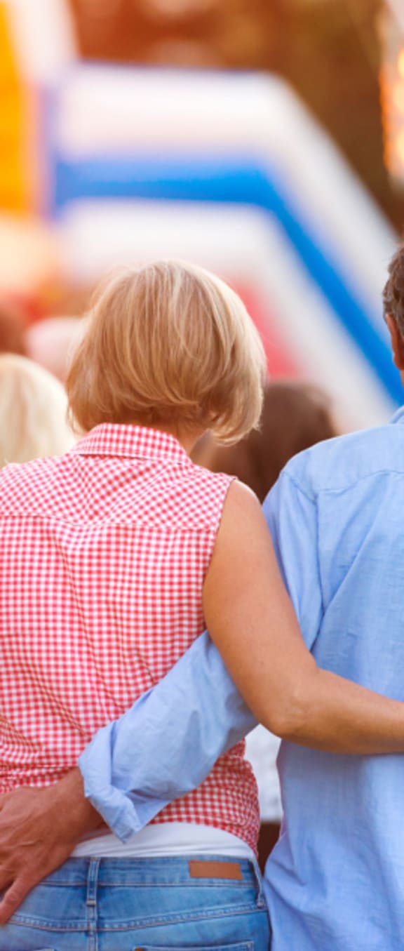 a man and a woman with their arms around each other