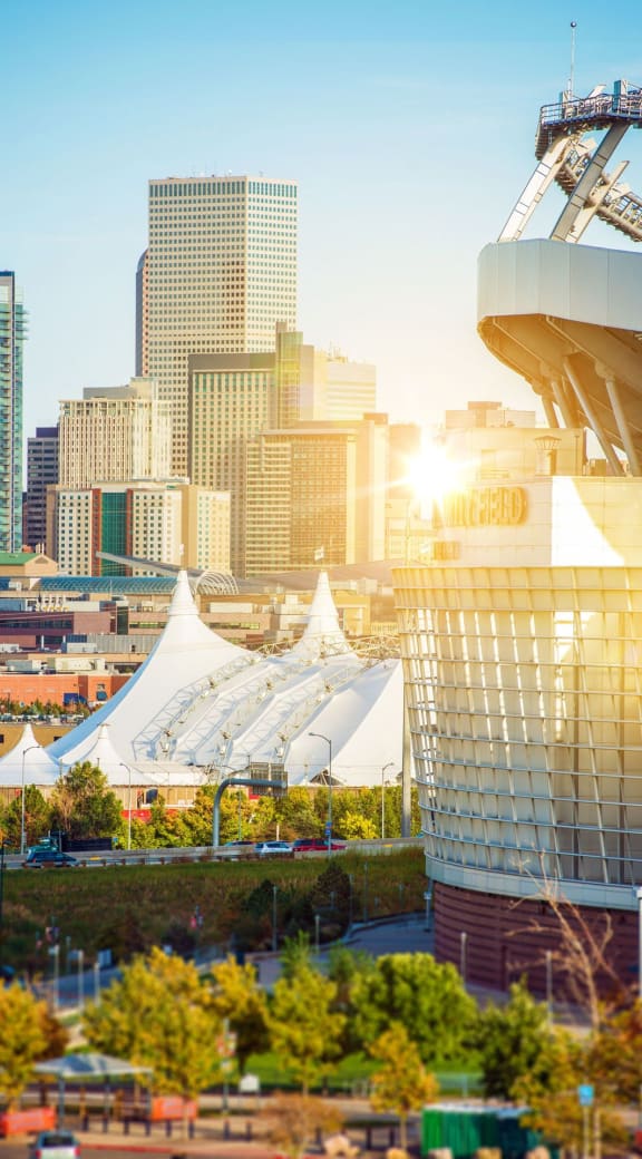 a cityscape of the city at sunset
