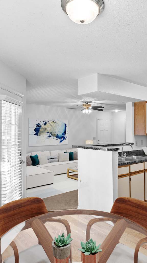 a resident clubhouse with a computer desk and chairs