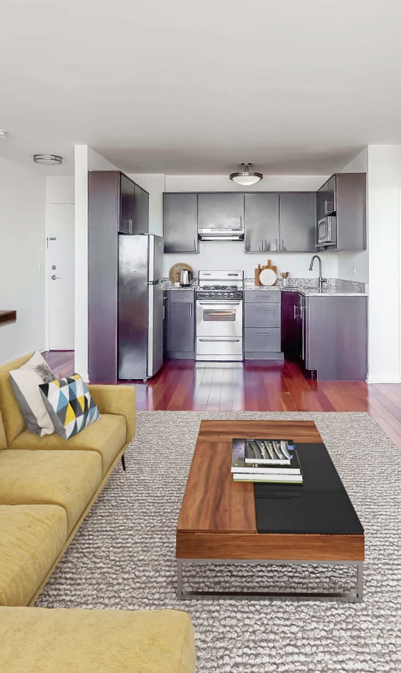 a living room with a yellow couch and a coffee table