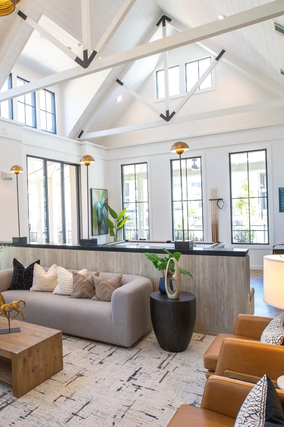 a living room with couches and a coffee table
