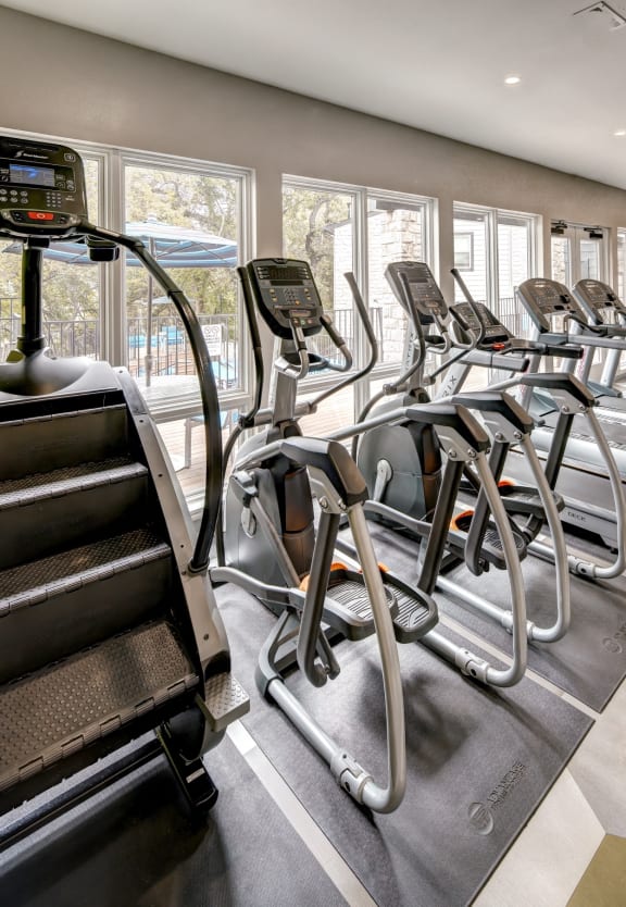 Retreat at Barton Creek Apartments Clubhouse with Pool Table, Seating Area, and Television