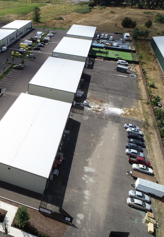 a large warehouse filled with stacks of boxes and other items