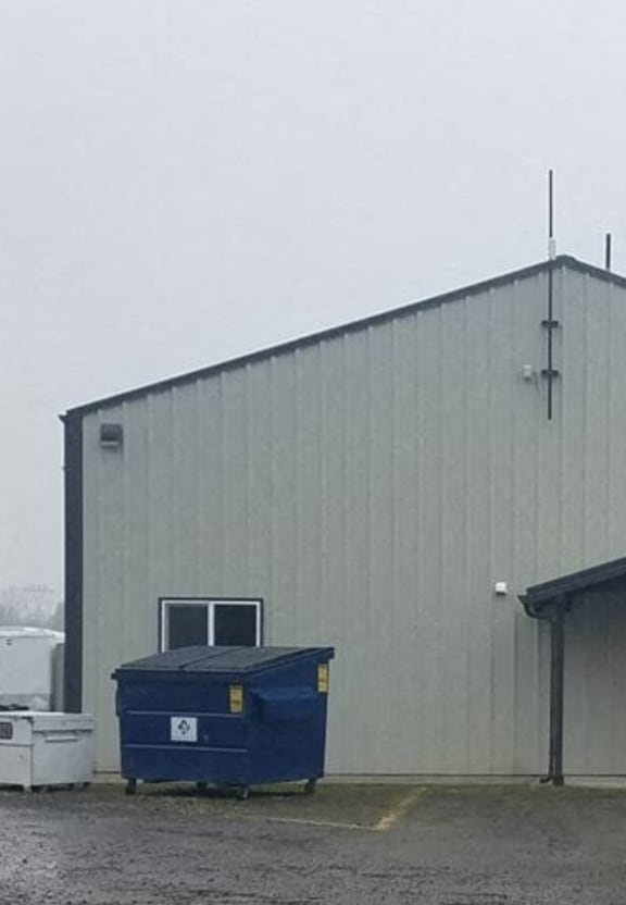 a large warehouse filled with stacks of boxes and other items
