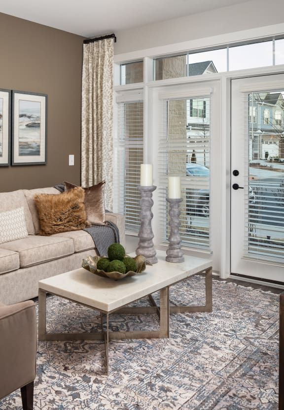 Modern Living Room at The Flats at Southlawn Apartments, GA, 30046