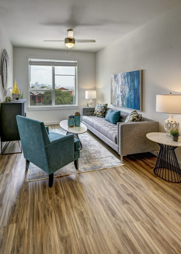 a living room with a couch and a chair