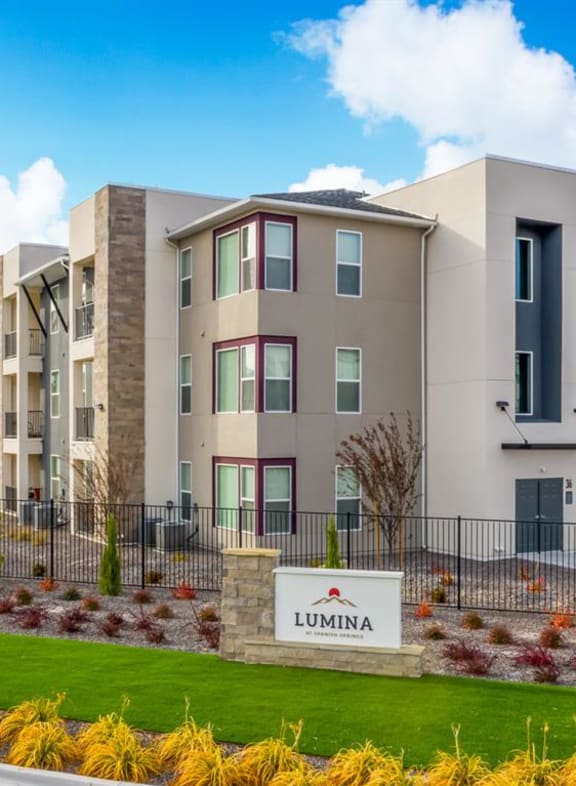 monument sign and apartment buildings | Lumina at Spanish Springs apartments