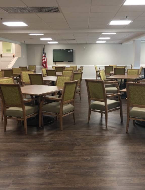 a large room with tables and chairs