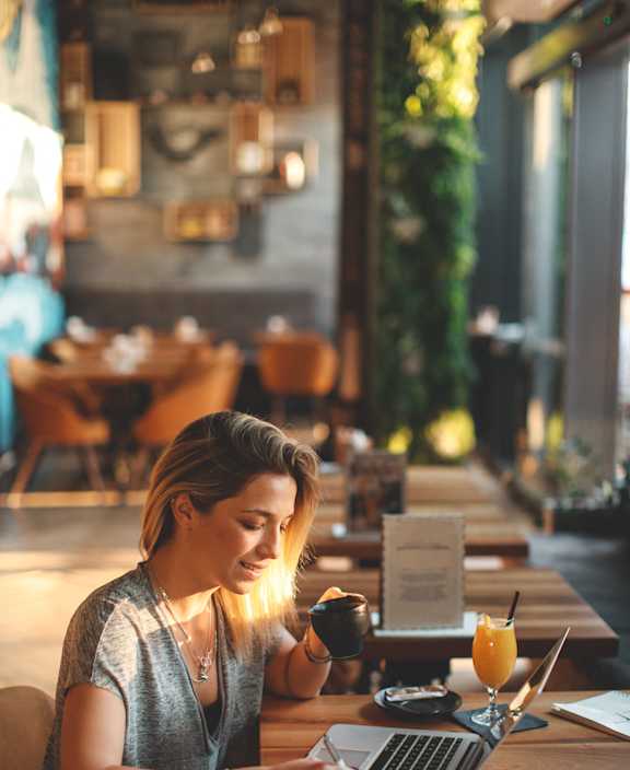 stock photo happy couple with a dog in their new home