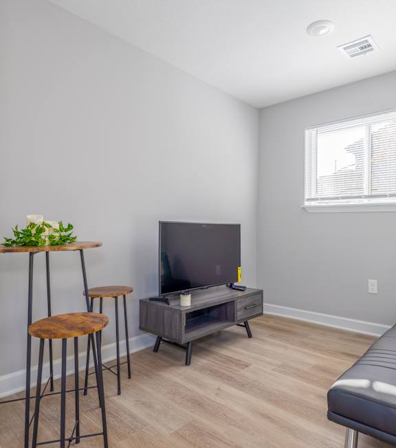 Living room with Television at University Digs Apartments, Pittsburg, 66762