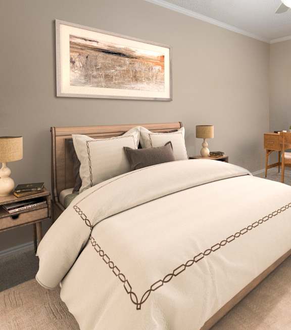 A bedroom with a large bed and a painting on the wall.
