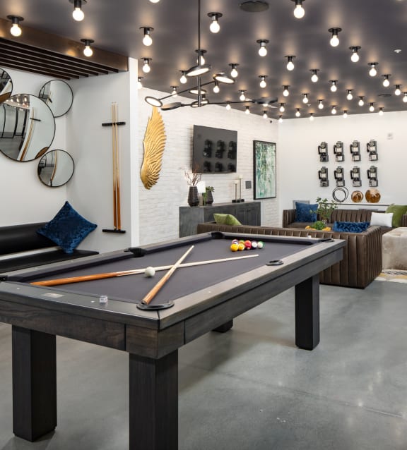 a pool table in a living room