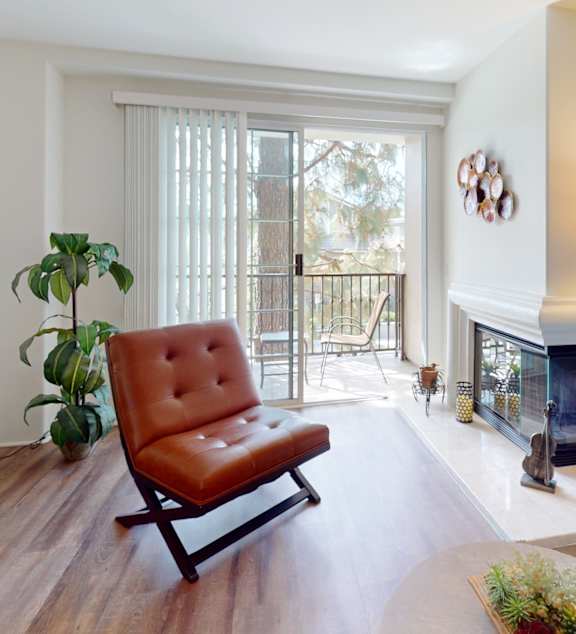 a reflection of a dining room with a kitchen in a window  at L'Estancia, Studio City, California