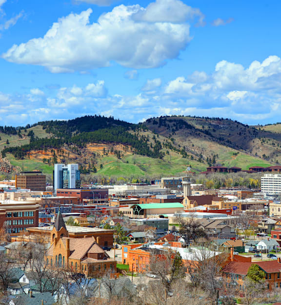 a city with a mountain in the background