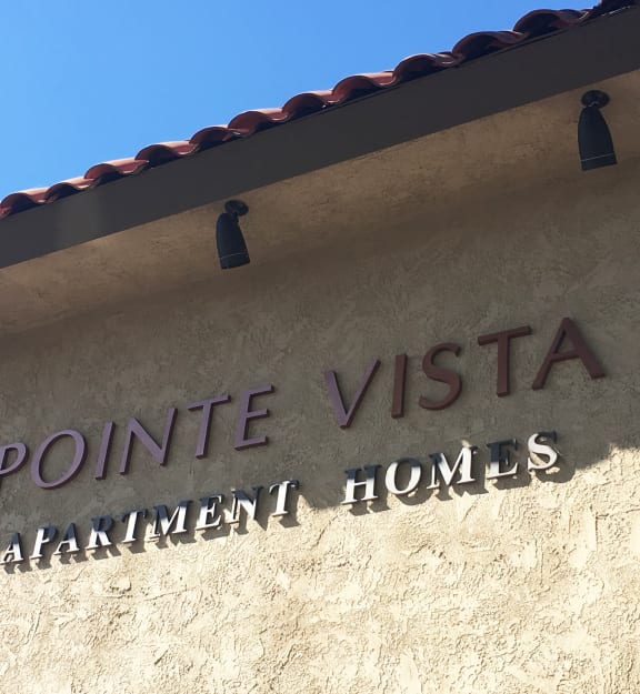 a view of the front of the point vista apartment homes building