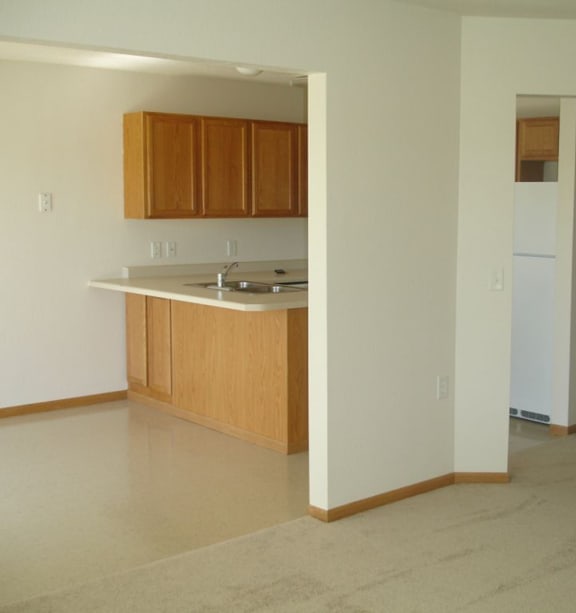 a bedroom with a bed and a ceiling fan
