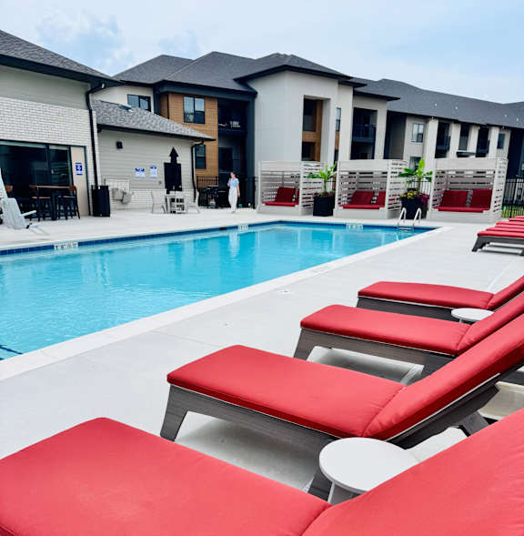 Woman wearing hat and floating in Pool at Artisan, Illinois, 62269