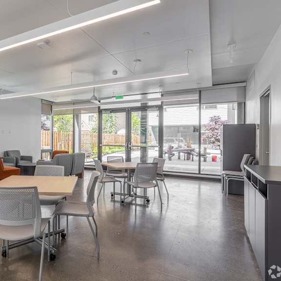 a conference room with a long table and chairs.
