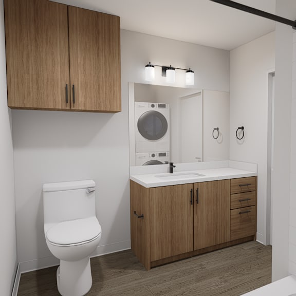 a white toilet sits next to a sink in a small bathroom.