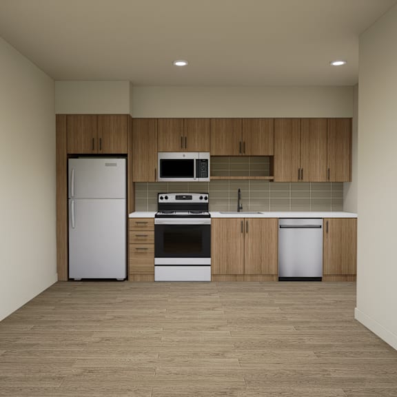 a kitchen with a refrigerator, oven, and microwave.