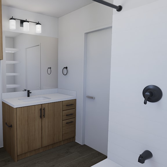 a white toilet sits next to a sink in a small bathroom.