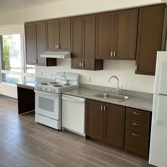 a kitchen at the acadia park apartments in houma, la