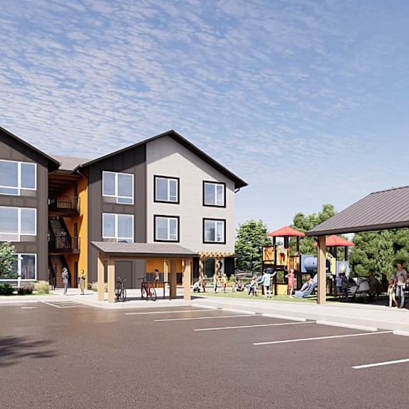 a large building with a parking lot in front of it.