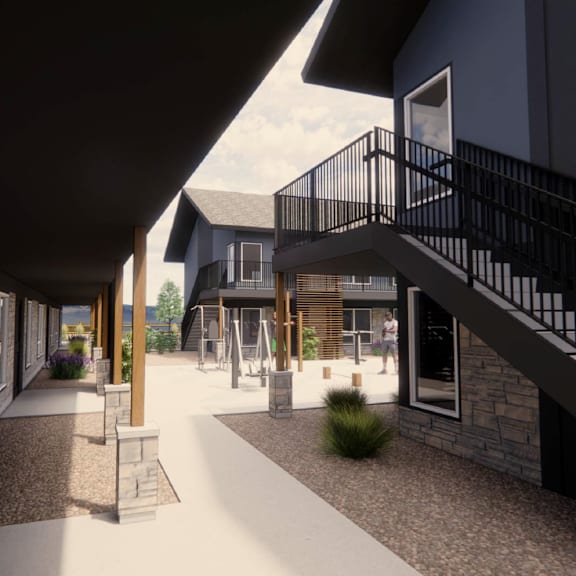 a modern building with a black railing and a white walkway.
