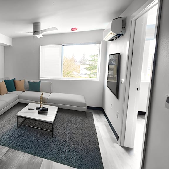an artist rendering of a living room and kitchen in an apartment