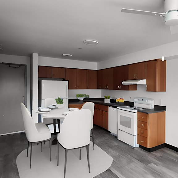 a kitchen and dining room with a table and chairs