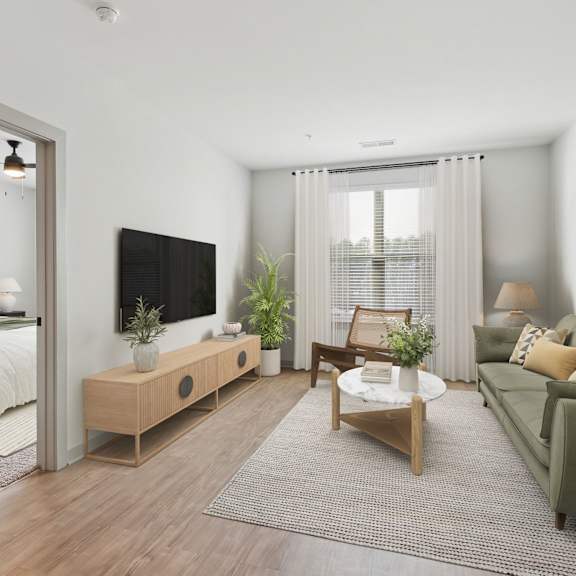 Thumbnail 7 of 21 A modern living room with a green couch and a wooden coffee table.
