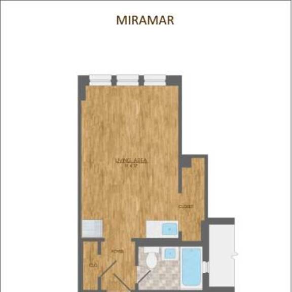Thumbnail 11 of 11 A floor plan of a studio apartment with a living area, kitchen, and bathroom.
