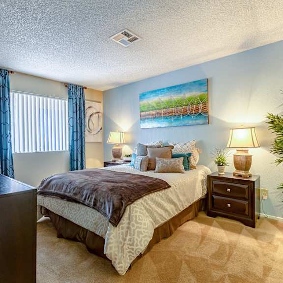 comfortable bedroom at playa vista apartments, pacifica sd management, nevada, 89110