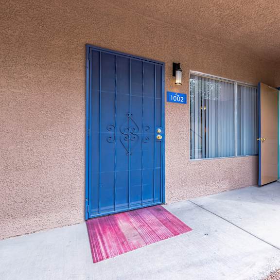 exterior front door washer dryer at playa vista apartments, pacifica sd management, nevada, 89110