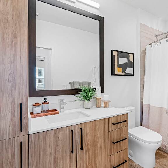 a bathroom with a sink and a toilet at madison waterford lakes, orlando, fl