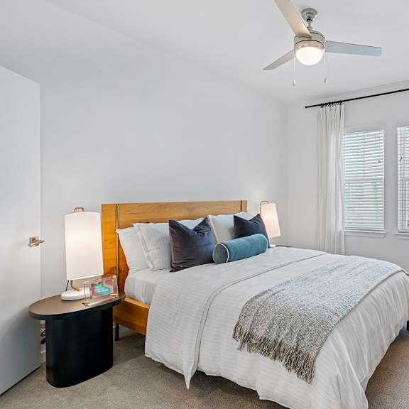 a bedroom with a bed and a ceiling fan at madison waterford lakes, orlando, 32826