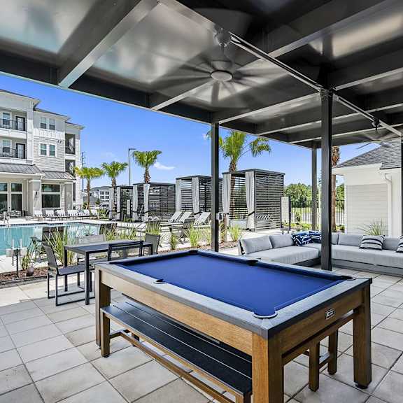 furnished patio with pool table at the preserve at ballantyne commons at madison waterford lakes, orlando, fl, 32826