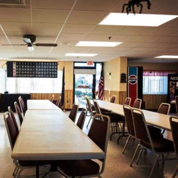 a conference room with a long table and chairs.