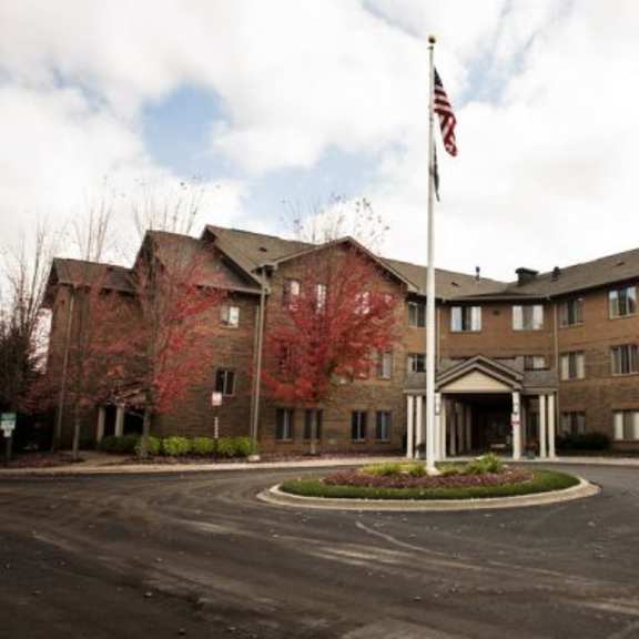 a large building with a flag on top of it.