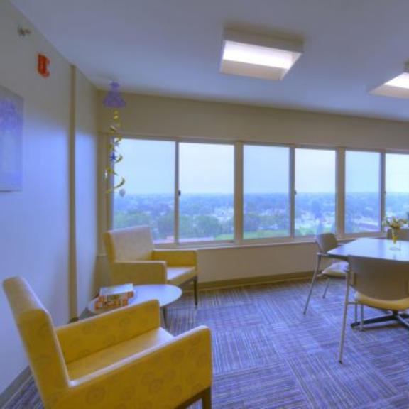 a conference room with a table and chairs.