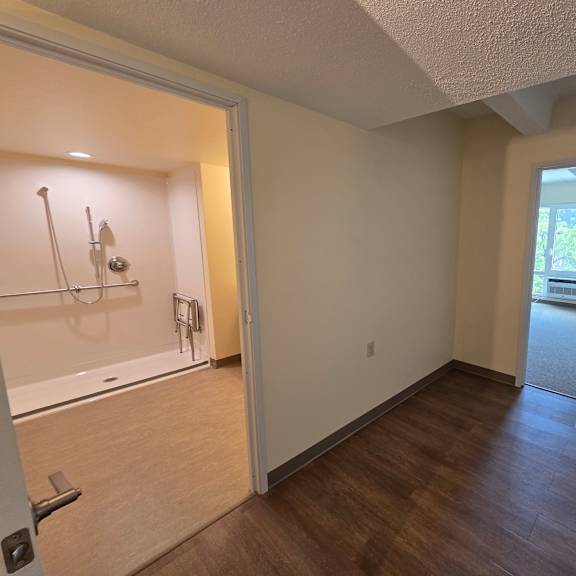 a room with a doorway leading to another room.