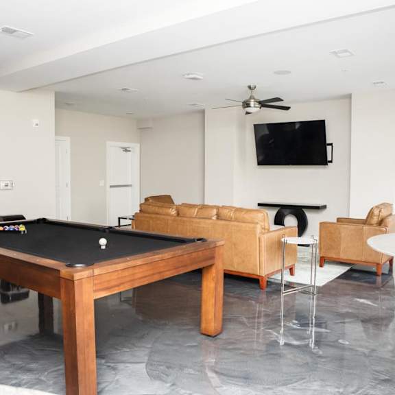 resident lounge with tvs and billiard table