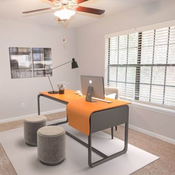a room with a desk and a chair.