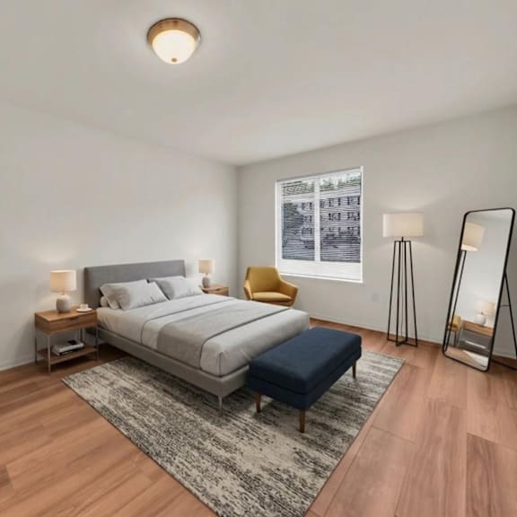 a bedroom with a large bed, a nightstand, a chair, and a rug.