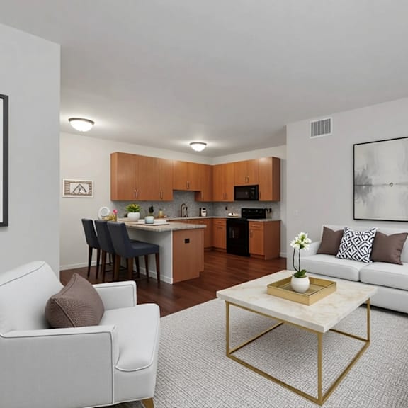 a modern living room with a white sofa, a coffee table, and a dining area in the background.