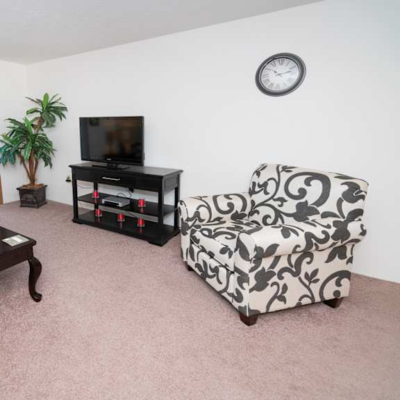 spacious living area at boggan estates apartments, belden, 38826